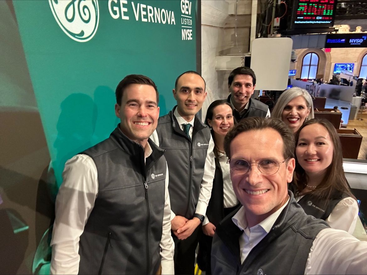 Steven Baert with GE Vernova employee ambassadors at NYSE on launch day