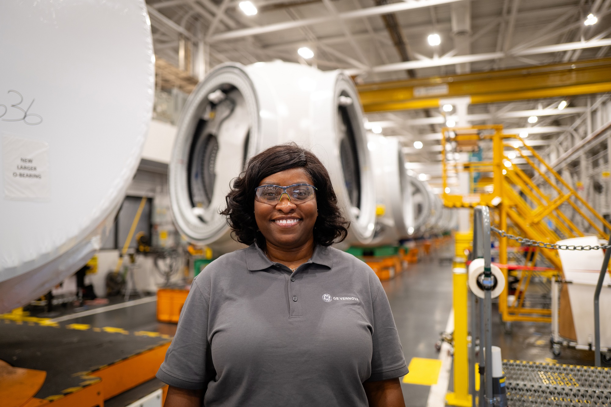 Woman standing on a factory floor