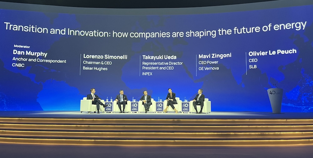 A panel of people onstage