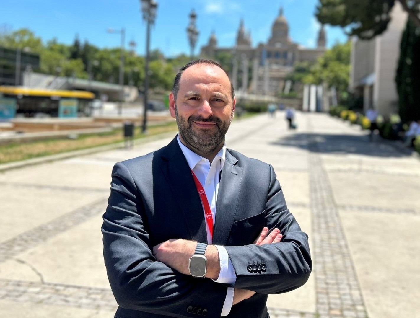 Bernard Dagher posing with arms crossed