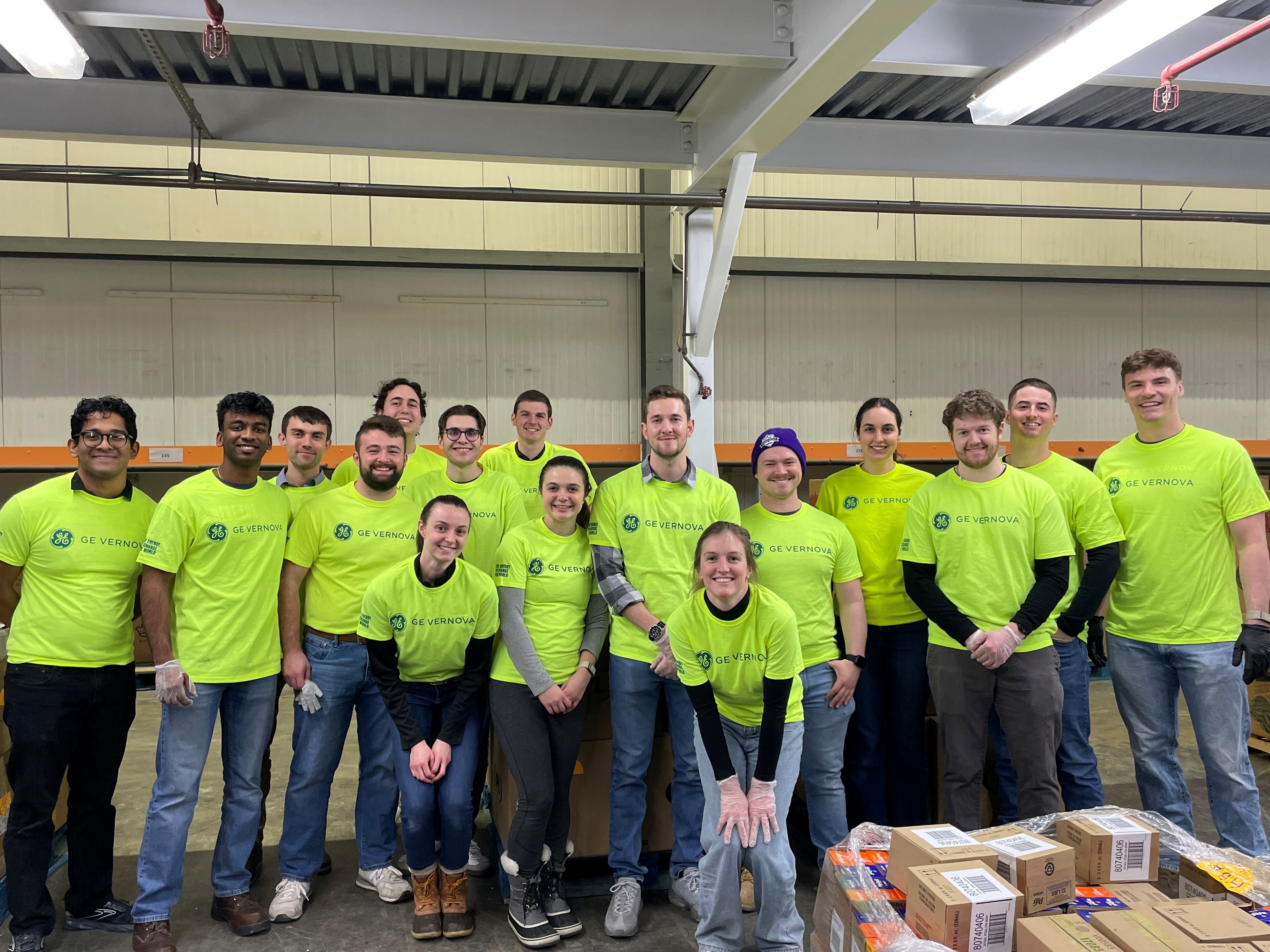 Group of people in yellow GE Vernova t-shirts