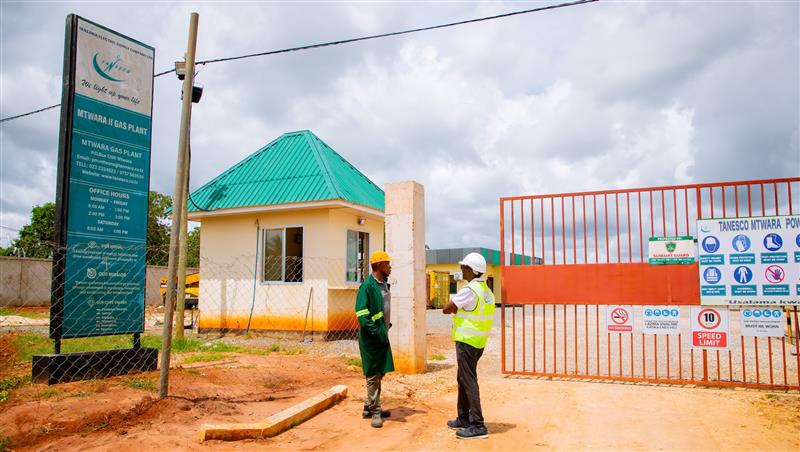 People inspecting parts